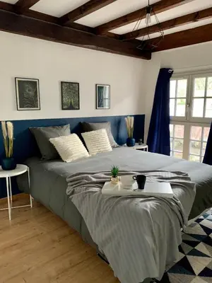 Un ou plusieurs lits dans un hébergement de l'établissement Appartement les Bleuets - Centre ville de Saumur