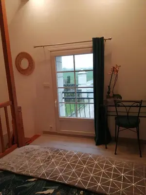 Un ou plusieurs lits dans un hébergement de l'établissement Le clos des augers. Chambre Descartes