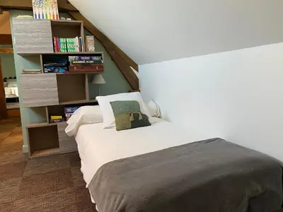 Un ou plusieurs lits dans un hébergement de l'établissement Gîte de la maison de Triboulet- Amboise