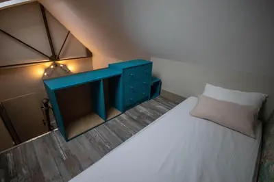 Un ou plusieurs lits dans un hébergement de l'établissement l'Atelier Chambourdin - Maison/Loft Centre Blois