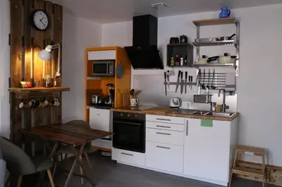 Cuisine ou kitchenette dans l'établissement Le Studio de Sophie