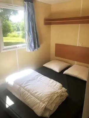 Un ou plusieurs lits dans un hébergement de l'établissement Le clos de Launay