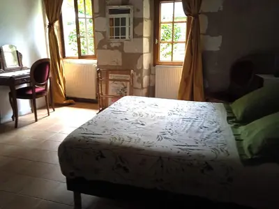 Un ou plusieurs lits dans un hébergement de l'établissement La Closerie