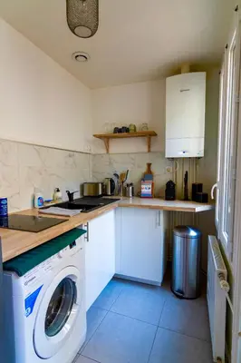 Cuisine ou kitchenette dans l'établissement Le Chanzy-Terrasse privative