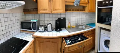 Cuisine ou kitchenette dans l'établissement Appart T2 Prefecture et Centre Ville