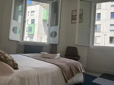Un ou plusieurs lits dans un hébergement de l'établissement Hotel TULTY