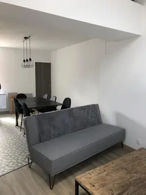 Coin salon dans l'établissement LA PETITE MAISON DE TATATE