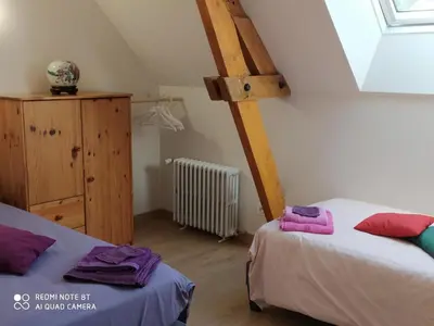 Un ou plusieurs lits dans un hébergement de l'établissement Gîte élégant en Touraine avec jardin clos et WIFI - FR-1-381-505