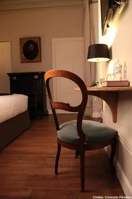 Télévision ou salle de divertissement dans l'établissement Hôtel Le Gentleman