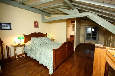Un ou plusieurs lits dans un hébergement de l'établissement Manoir Du Bois Noblet