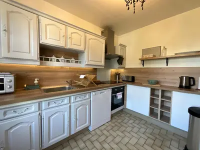 Cuisine ou kitchenette dans l'établissement Maison familiale Blois piscine et SPA