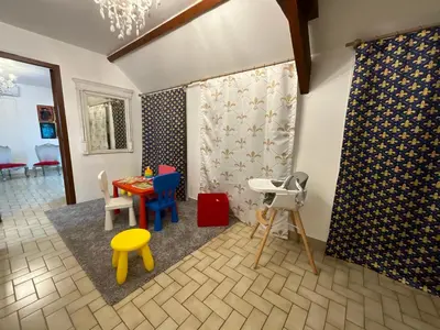 Coin salon dans l'établissement Maison familiale Blois piscine et SPA
