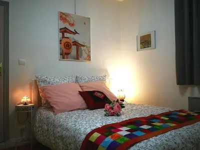 Un ou plusieurs lits dans un hébergement de l'établissement NICE APPARTEMENT