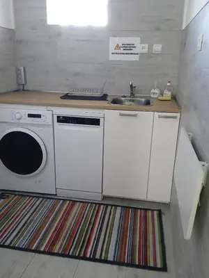 Cuisine ou kitchenette dans l'établissement Maison de vacances Sol & Piper