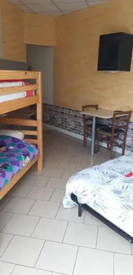 Un ou plusieurs lits dans un hébergement de l'établissement À 200m du Château 30 min du Circuit du Mans