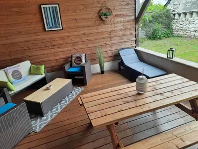 Coin salon dans l'établissement Gîte charmant 4 pers avec jardin privé, proche Saumur et bords de Loire, tout inclus - FR-1-622-5