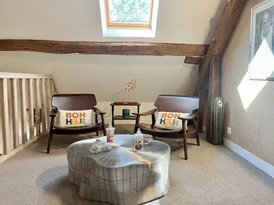 Coin salon dans l'établissement Le Clos des Châteaux