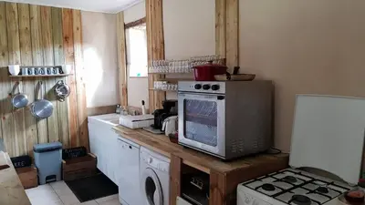 Cuisine ou kitchenette dans l'établissement Les Roberderies