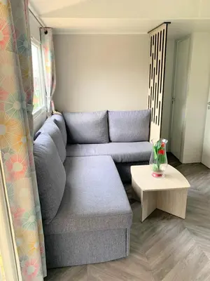 Coin salon dans l'établissement MOBILHOME 3 CH CAMPING 4*