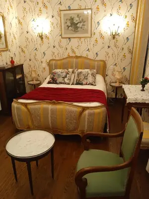 Un ou plusieurs lits dans un hébergement de l'établissement Chambre d'hôtes LA BELLE SAISON