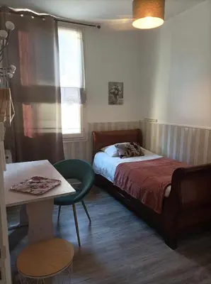 Un ou plusieurs lits dans un hébergement de l'établissement La Boussole - Maison meublée 3 chambres 6 pers.