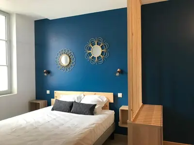 Un ou plusieurs lits dans un hébergement de l'établissement Riva Lodge