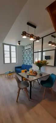 Coin salon dans l'établissement Riva Duplex
