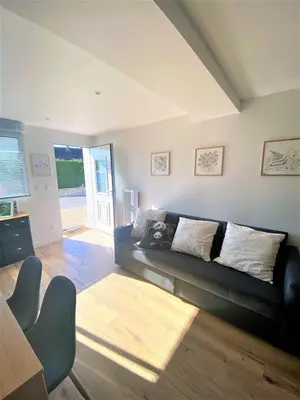 Coin salon dans l'établissement La Maison d'Elena 1,5km du Zoo,confortable et détente assurée