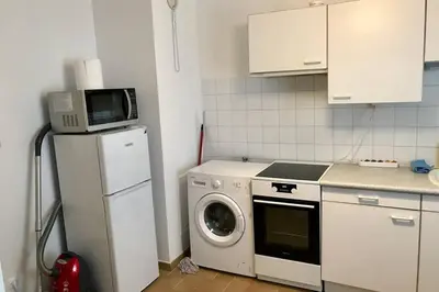 Cuisine ou kitchenette dans l'établissement Appart T2 spacieux proche Gare TGV
