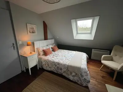 Un ou plusieurs lits dans un hébergement de l'établissement Chambres d hôtes avec Piscine et Spa La Folière Saumur