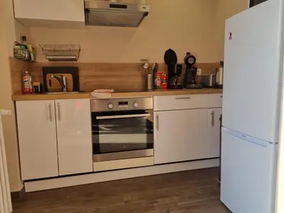 Cuisine ou kitchenette dans l'établissement Appartement à la campagne avec piscine