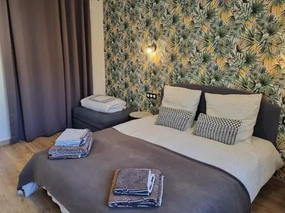 Un ou plusieurs lits dans un hébergement de l'établissement Appartement à la campagne avec piscine