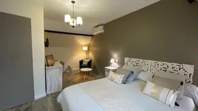 Un ou plusieurs lits dans un hébergement de l'établissement LA MAISON DE TRIBOULET Chambres et table d'hôtes -Amboise-