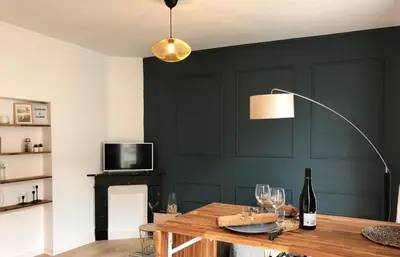 Télévision ou salle de divertissement dans l'établissement Le Tanin -Appartement entier avec Balcon