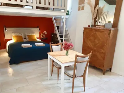 Un ou plusieurs lits dans un hébergement de l'établissement En plein Coeur : charmant gite centre Amboise