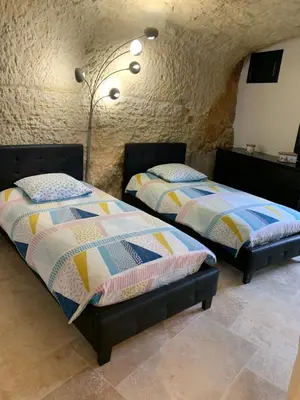 Un ou plusieurs lits dans un hébergement de l'établissement Au Petit Nice