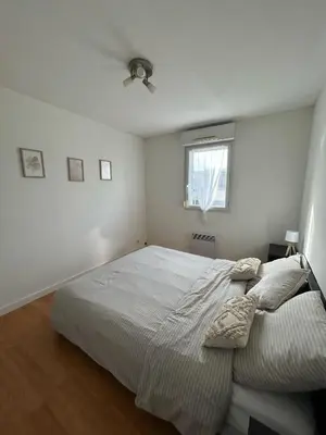 Un ou plusieurs lits dans un hébergement de l'établissement Appartement T3 proche circuit du Mans