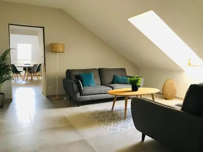 Coin salon dans l'établissement Les Chambres de La Varenne - Chambres d'hôtes