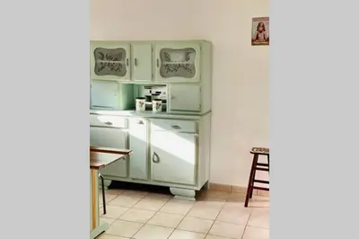 Cuisine ou kitchenette dans l'établissement Chez Dedette