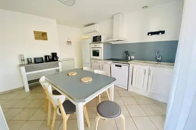 Cuisine ou kitchenette dans l'établissement Chez Dedette