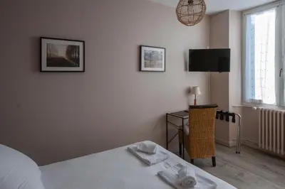 Un ou plusieurs lits dans un hébergement de l'établissement lhotel
