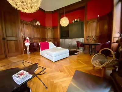 Coin salon dans l'établissement Château de la Coudraie et La Petite Coudraie