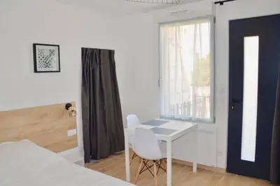 Un ou plusieurs lits dans un hébergement de l'établissement Superbe studio idéalement situé !