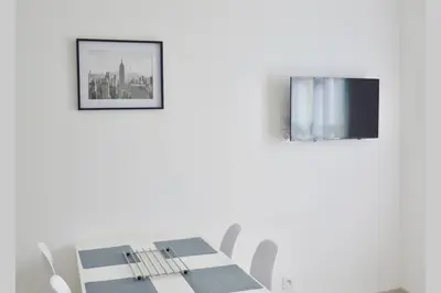 Télévision ou salle de divertissement dans l'établissement Les forges 2 pièces étage