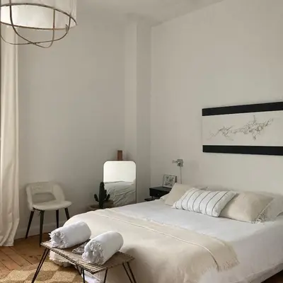Un ou plusieurs lits dans un hébergement de l'établissement la boutique mj décoration vous propose de découvrir ses deux chambres d'hôtes