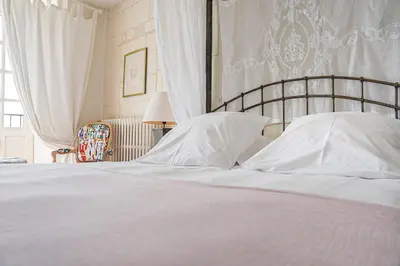Un ou plusieurs lits dans un hébergement de l'établissement LE PRESBYTÈRE DE LA CITE ROYALE DE LOCHES