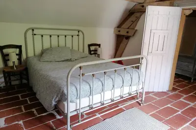 Un ou plusieurs lits dans un hébergement de l'établissement LE COTTAGE DES SABLONS près du zoo de Beauval