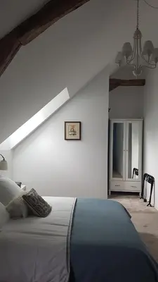Un ou plusieurs lits dans un hébergement de l'établissement Les 7 Tilleuls - Chambres d'hôtes