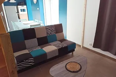 Coin salon dans l'établissement Petite maison de charme