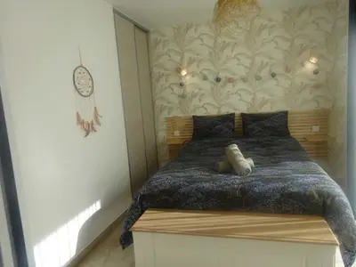 Un ou plusieurs lits dans un hébergement de l'établissement Charmant gîte cozy près du Mans avec jardin, terrasse, proche commodités et activités. - FR-1-410-336
